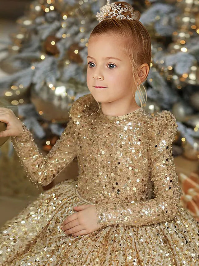 Close-up of the jewel neckline and bow detail on the princess flower girl dress.