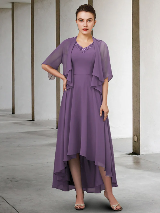 Elegant two-piece A-line Mother of the Bride dress with V-neck, half sleeves, and pleats.