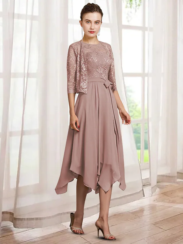 Elegant two-piece A-line mother of the bride dress with jewel neck, half sleeves, and tea length in chiffon lace.
