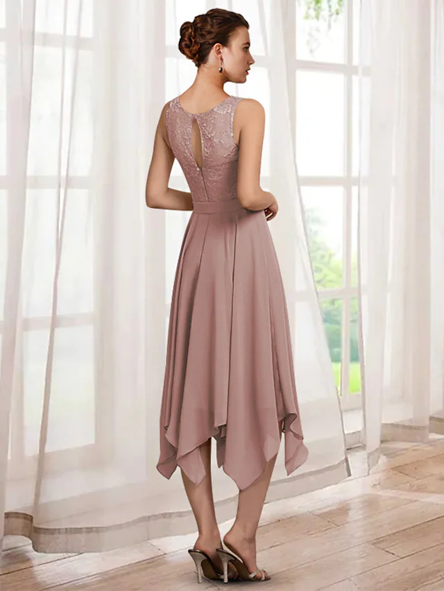 Close-up of the chiffon lace fabric and sash detail on the mother of the bride dress.