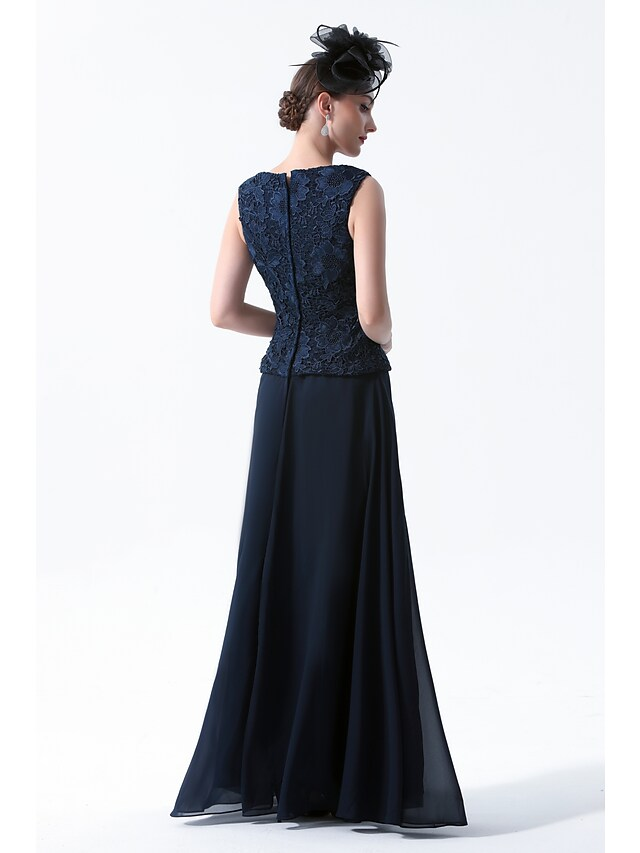 Close-up of the embroidered detail on the elegant two-piece Mother of the Bride dress.