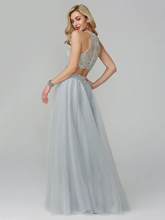 Back view of the floor-length two-piece evening gown.