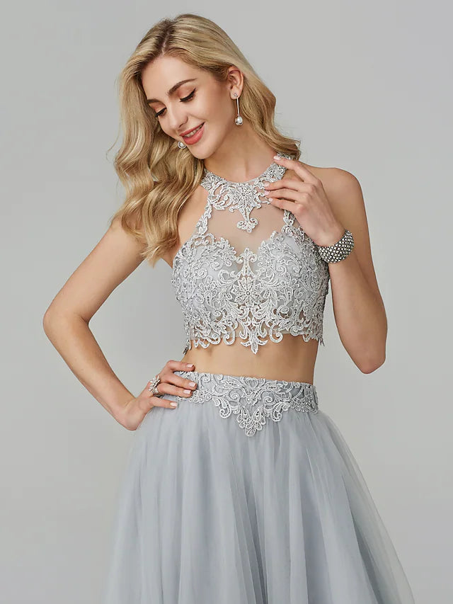 Side profile of the elegant sleeveless empire dress.