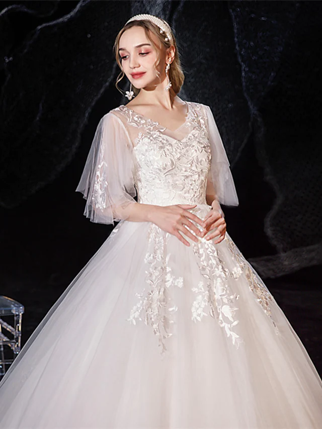 Full length view of romantic ball gown bridal dress.