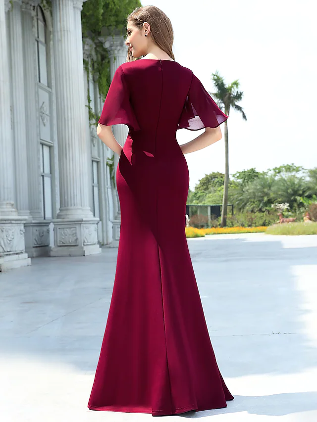 Back view of a floor-length chiffon bridesmaid dress.