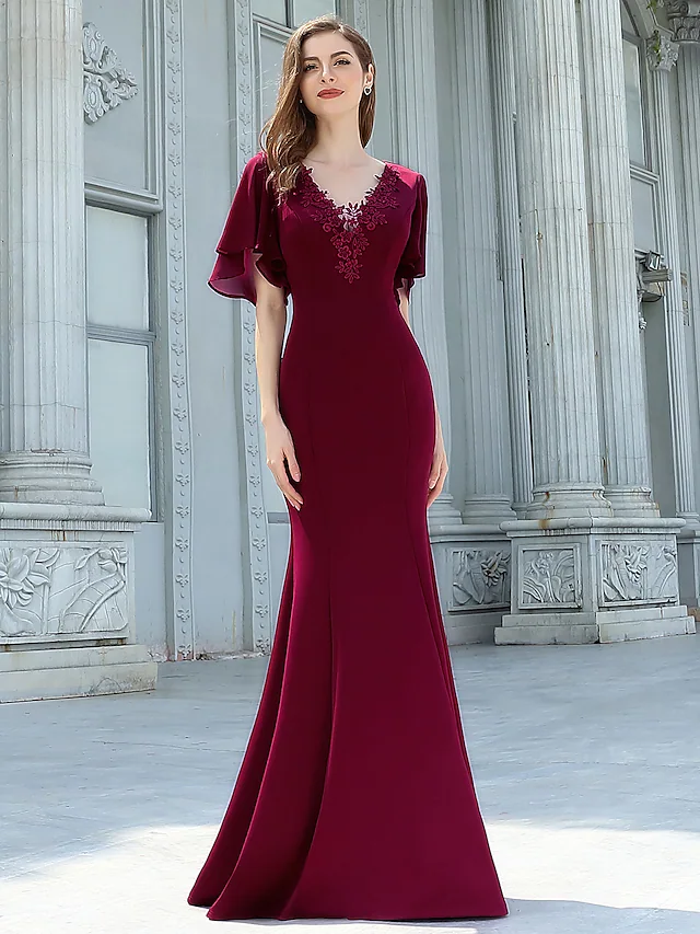 Close-up of delicate appliques on a chiffon dress.