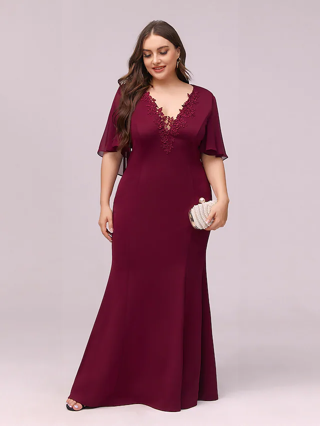 Full length view of a formal V-neck dress.