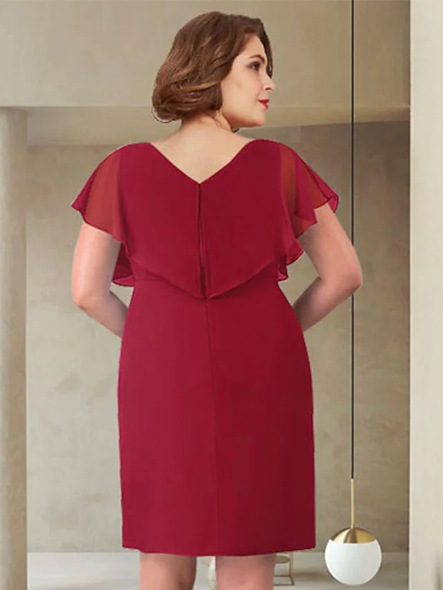 Side view of the V-neck chiffon dress, showing the knee-length hem and ruched details.