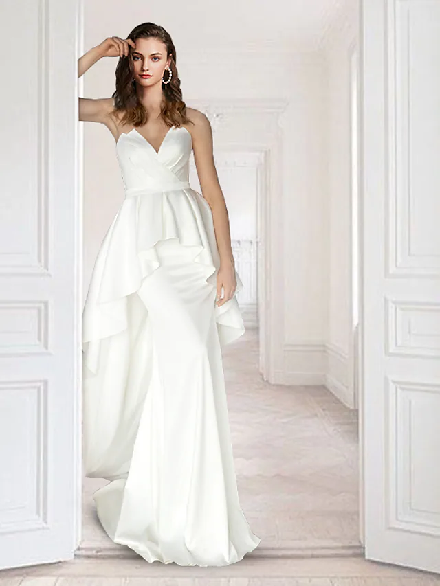 Elegant V-neck satin wedding dress with a court train and ruffles.