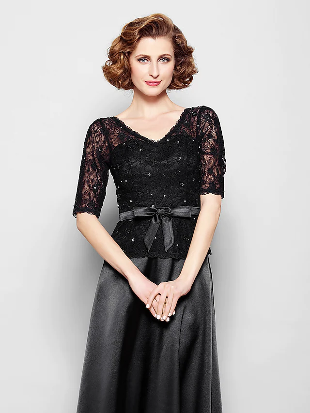 Back view of the elegant Mother of the Bride dress, highlighting the lace and stretch satin fabric.
