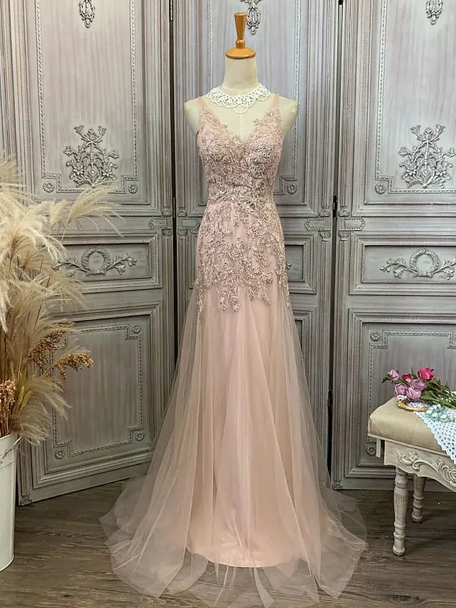 Full view of the elegant V-neck mermaid trumpet prom dress.