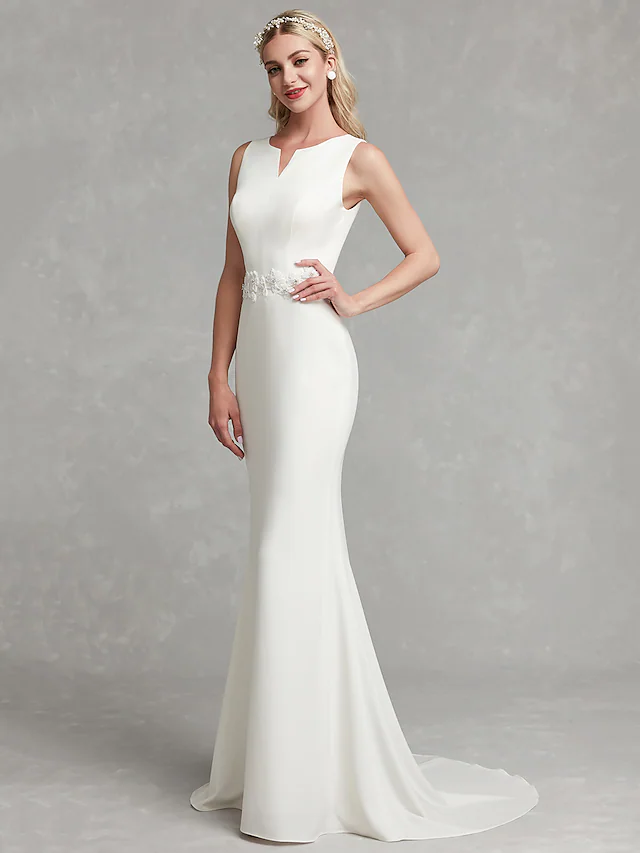 Side view of satin A-line wedding gown.