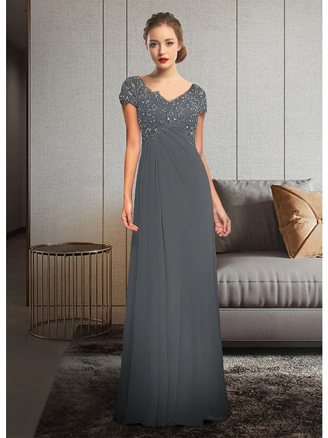 Elegant V-neck short sleeve Mother of the Bride gown with sequin appliques and ruching, front view.