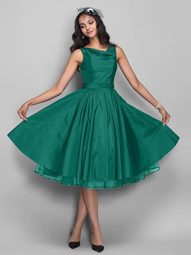 Front view of the ball gown cocktail dress, highlighting the V-neck and pleats.