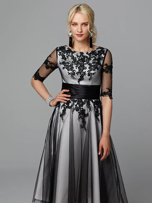 Side view of vintage lace dress with ribbon appliques.