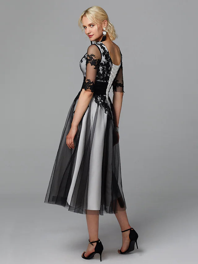 Back view of A-line wedding guest dress.