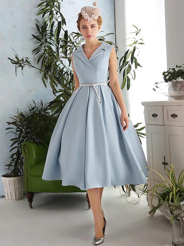 Elegant A-line V-neck tea length dress with a sash ribbon.