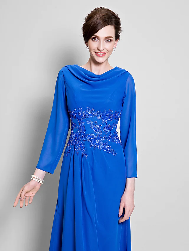 Side profile of the elegant long sleeve mother of the bride gown.
