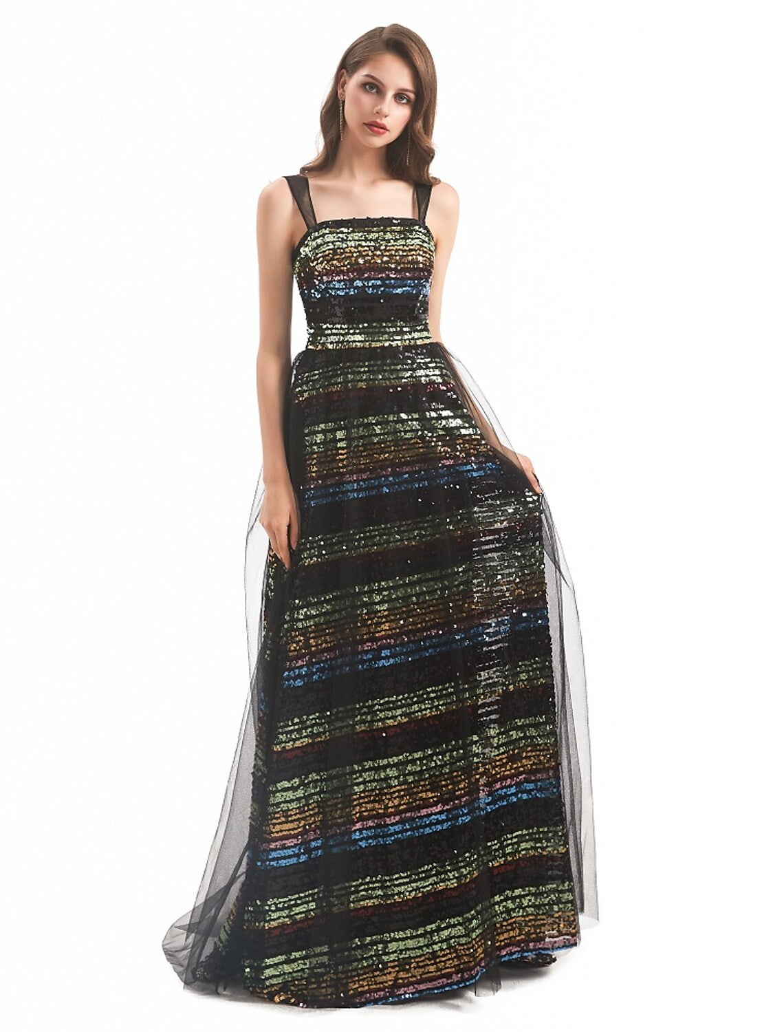 Full length view of the woman in the vintage-inspired sequin tulle dress.