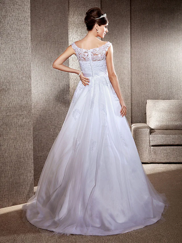 Side view of the A-line wedding dress, showcasing its silhouette.