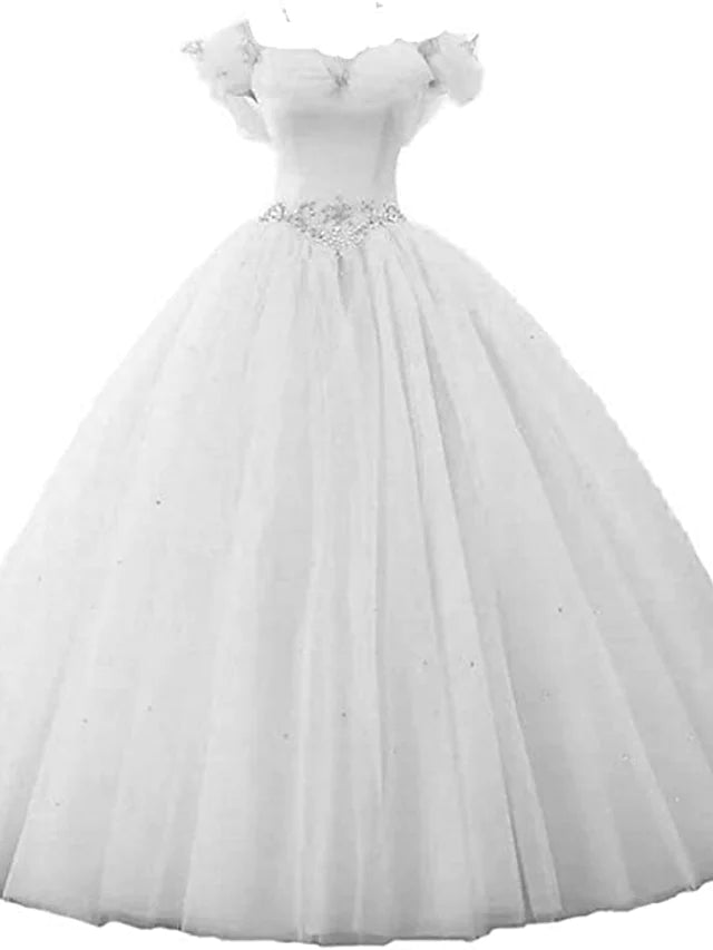 Close-up of the pearl and butterfly beading on the off-shoulder ball gown.