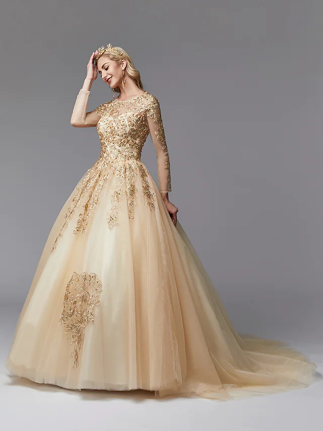 Side view of the elegant white ball gown wedding dress, showing the voluminous tulle skirt.