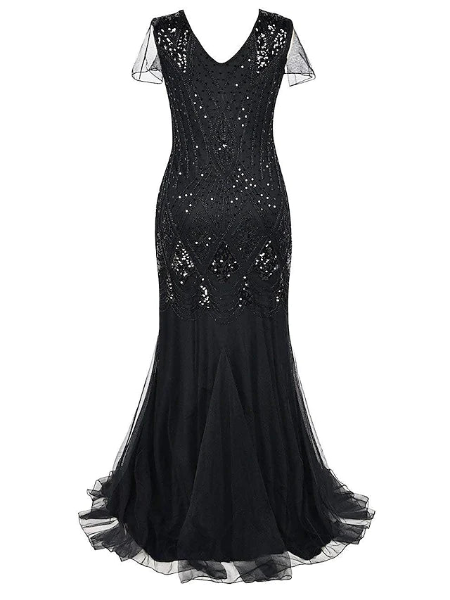 Close-up of the intricate crystal beading and sequin embellishments on the V-neck evening gown.
