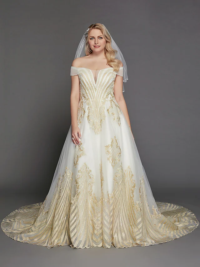 Side profile of a princess off-shoulder wedding dress with intricate lace details.