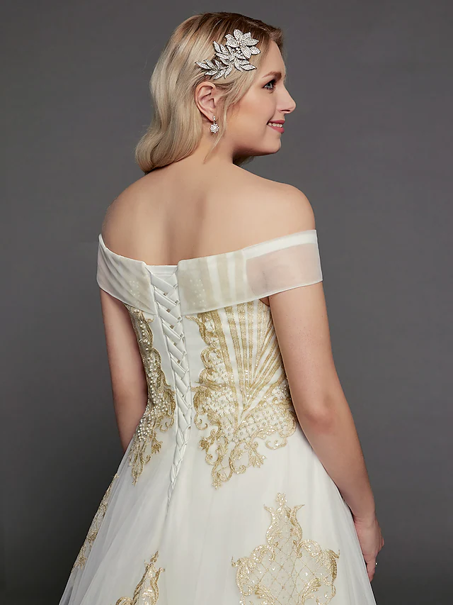 Full length view of the princess wedding gown with its elegant chapel train.