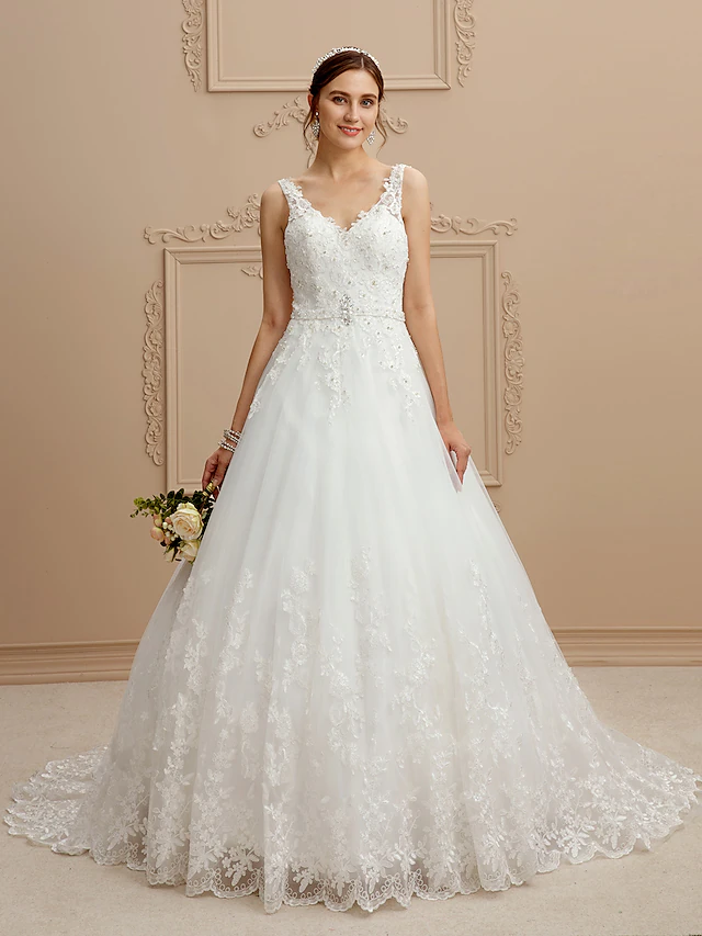 Front view of elegant V-neck ball gown wedding dress with court train.