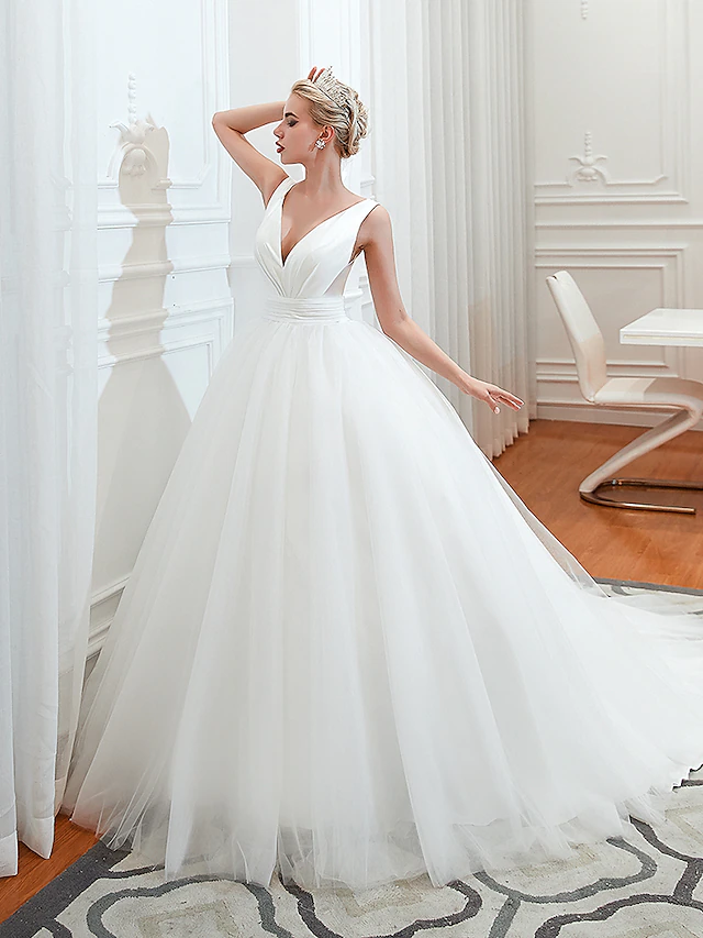 Back view of the backless ball gown wedding dress with a court train.