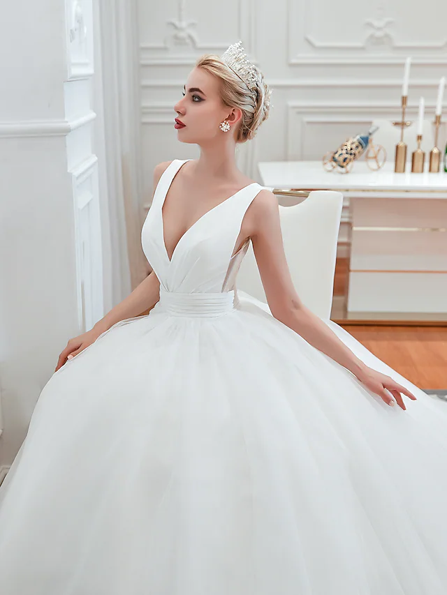 Another angle of the ball gown wedding dress with court train.