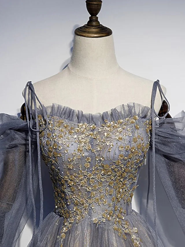 Side view of a floor-length A-Line dress with sequin details.