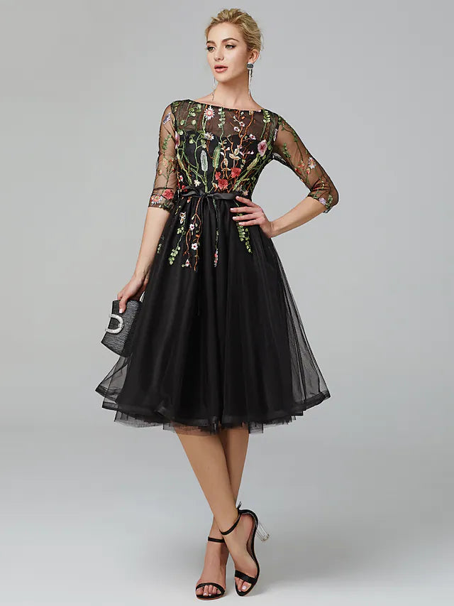 Side profile of the A-Line Little Black Dress, highlighting the long sleeves and knee-length cut.