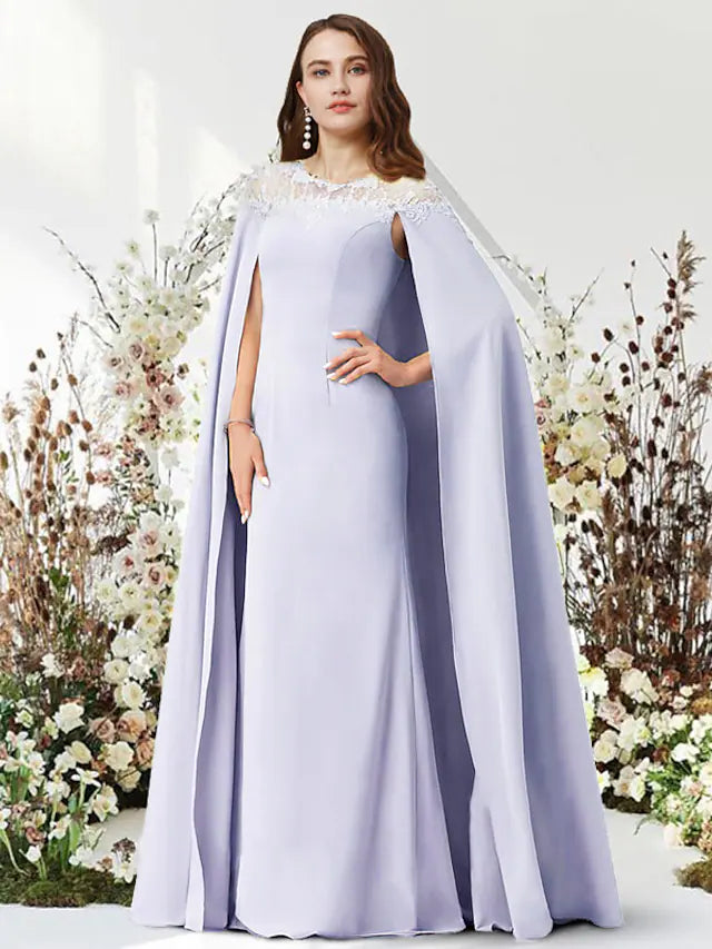 Back view of a woman in a floor-length sleeveless sheath party dress.