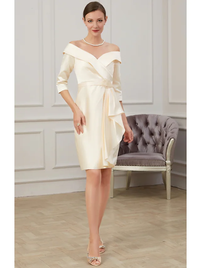 Plus size off-shoulder knee-length mother of the bride dress with ruffles and ruching.
