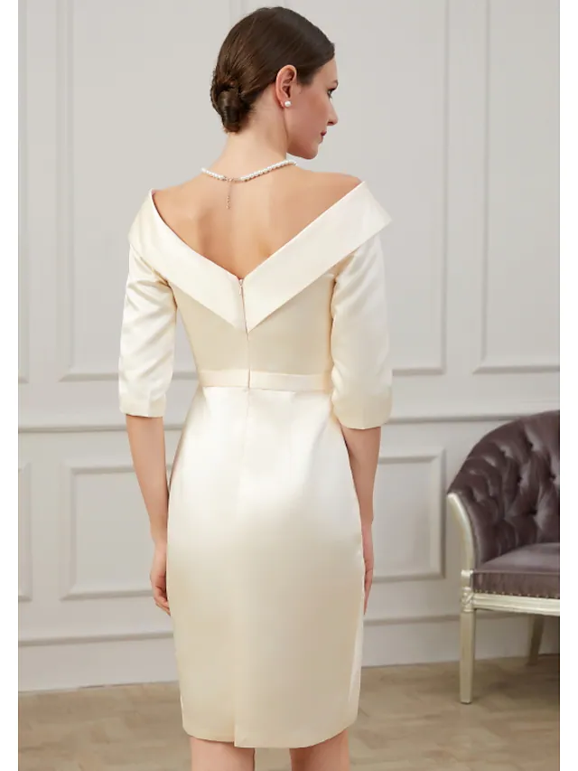 Sophisticated off-shoulder dress for special occasions, shown on a model.
