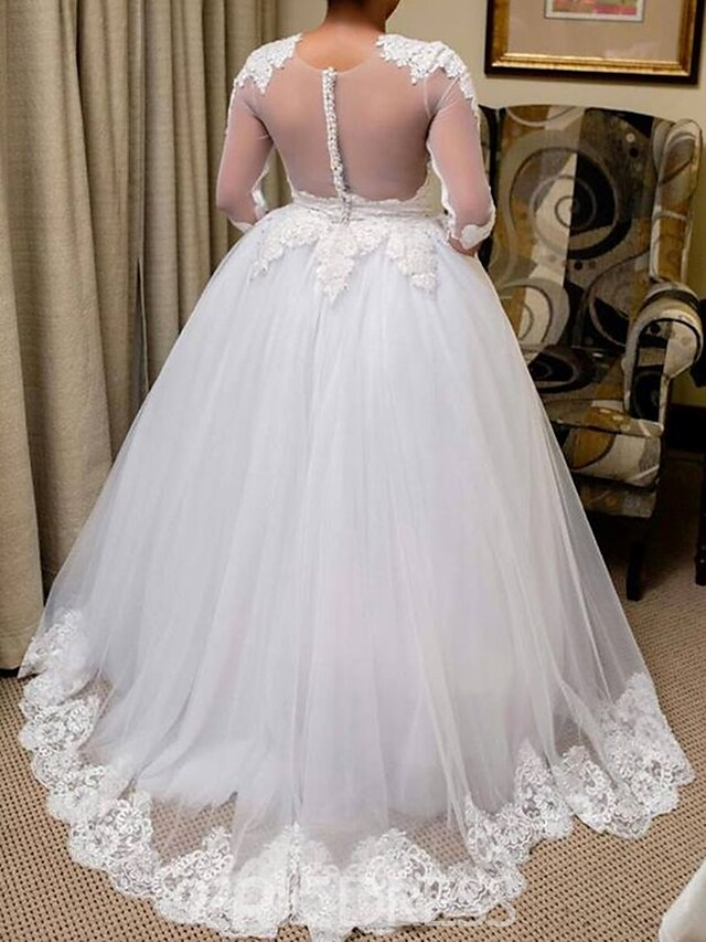 Back view of the Princess A-Line wedding dress showing appliques and pleats.