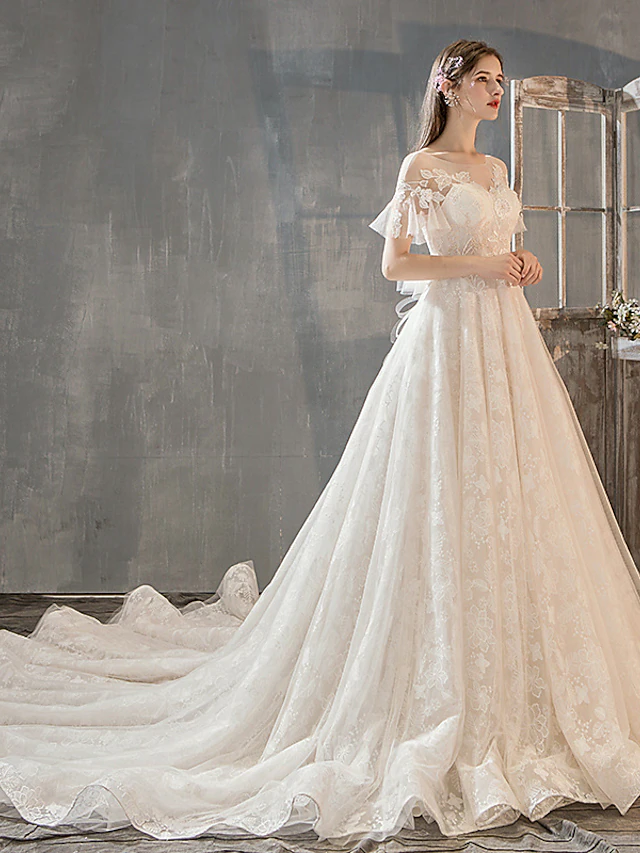 Back view of A-Line wedding dress showing court train and bow detail.