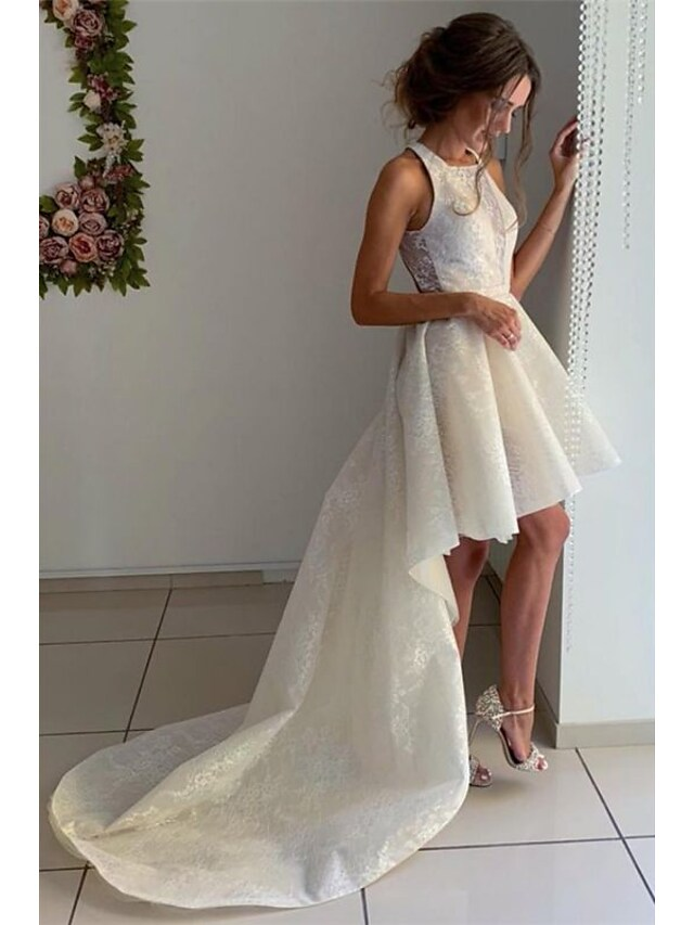 Back view of A-line wedding dress showing pleats and organza fabric.