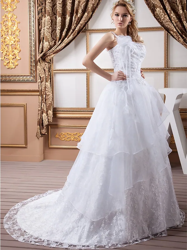Back view of A-Line wedding gown showing court train and ruffles.