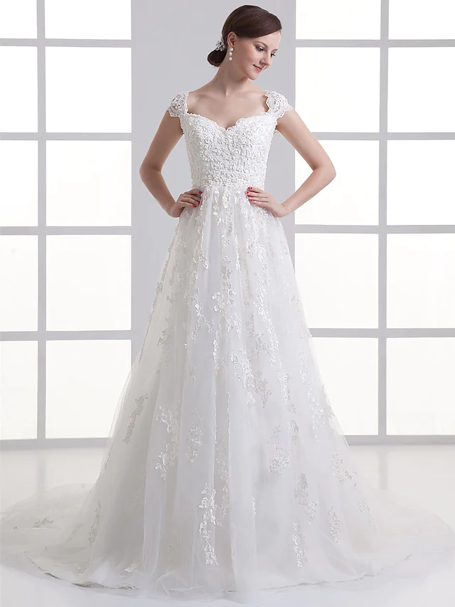 Elegant A-line wedding dress with sweetheart neckline and cap sleeves.
