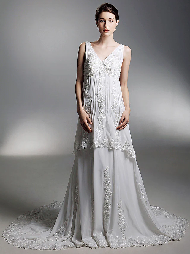 Back view of A-Line chiffon wedding dress showing chapel train.