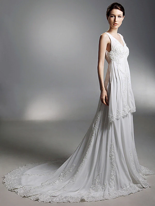 Close-up of chiffon fabric and V-neckline on wedding dress.