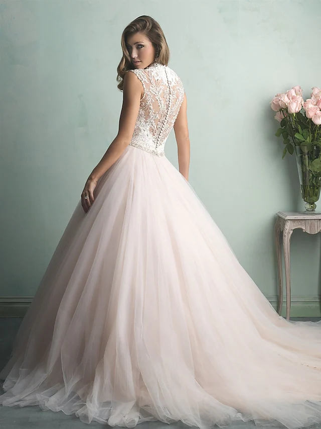 Close-up of the back of the A-Line wedding dress, showing illusion lace and intricate beading.