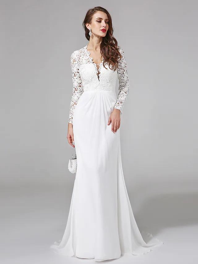 Back view of the flowing chiffon wedding gown.