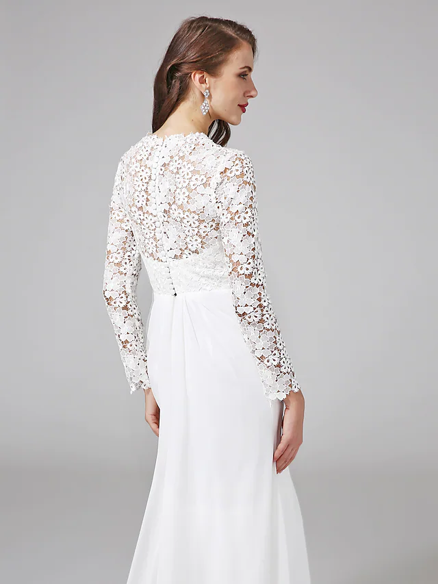 Flowing skirt of the long sleeve wedding gown.