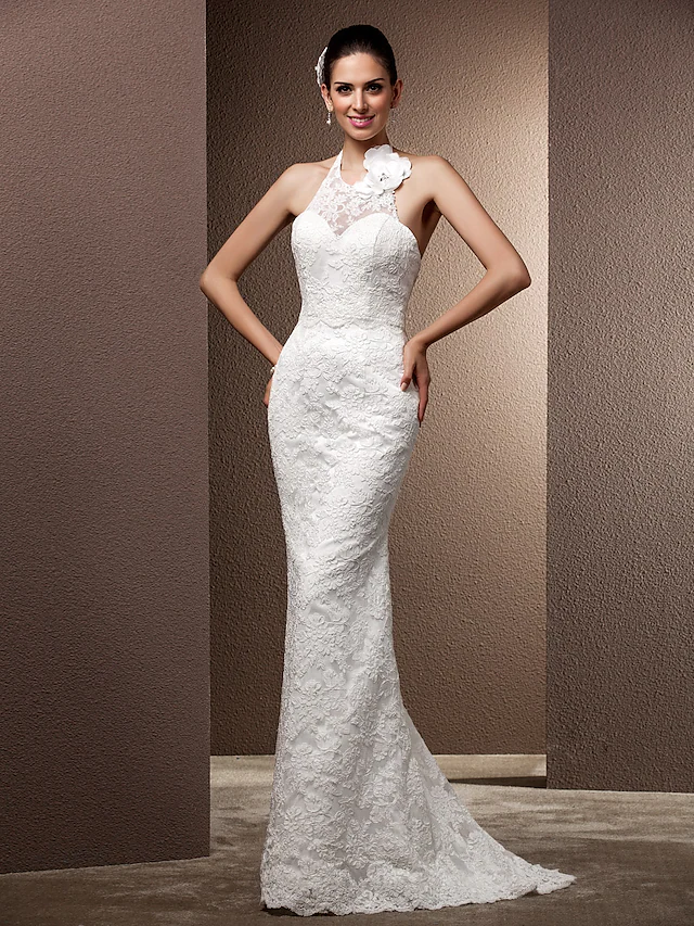 Front view of a romantic mermaid halter neck lace wedding dress with beading.