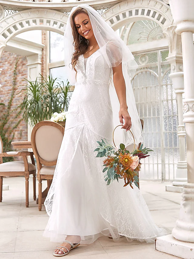 Close-up of the V-neckline and lace details.