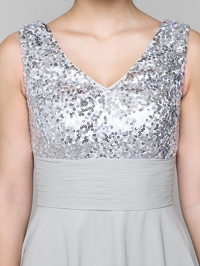 Close-up of sequin embellishments on a formal dress.